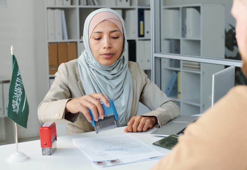 Modern Consular Officer Making Decision