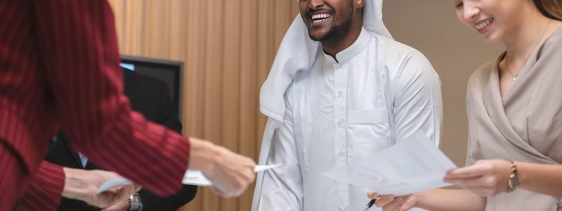 Successful entrepreneurs and business people group achieving goals, happy corporate team meeting to celebration concept, professional partner having success and project win in New Years at office